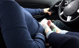 Amateur Girlfriend Delivers A Marvelous Footjob In The Car