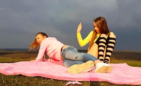 Two Horny Young Lesbians Masturbate Together In The Outdoors