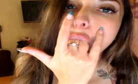 Provoking Brunette Babe Fingers Her Mouth And Blows A Dick