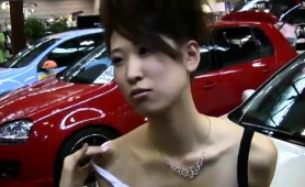 sexy-slender-japanese-model-flashes-her-cleavage-in-public
