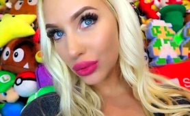 Beautiful Blonde Model Tries On Different Lipstick On Webcam