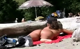 Nudist Beach Voyeur Finds A Sexy Brunette With A Perfect Ass